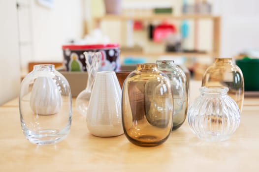 Classroom of Montessori kindergarten. Different glass Montessori items. Concept of children learning toy