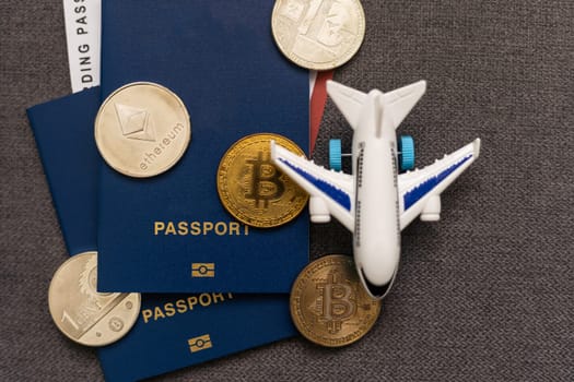 Bitcoin with aeroplane, passport. Cryptocurrency Business concept