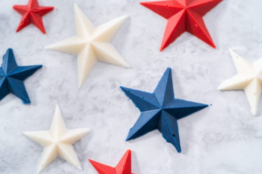 Homemade color chocolate stars that are made from color chocolate molds.