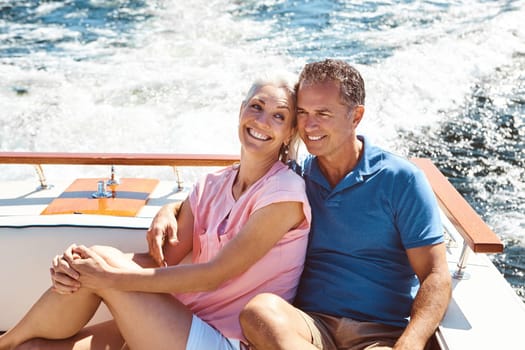 My hubby makes the best travel companion. a mature couple enjoying a relaxing boat ride