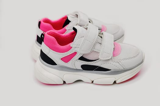 New sports sneakers for girls isolated on a white background