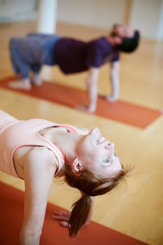 Yoga for body stress release. a young woman during a yoga class