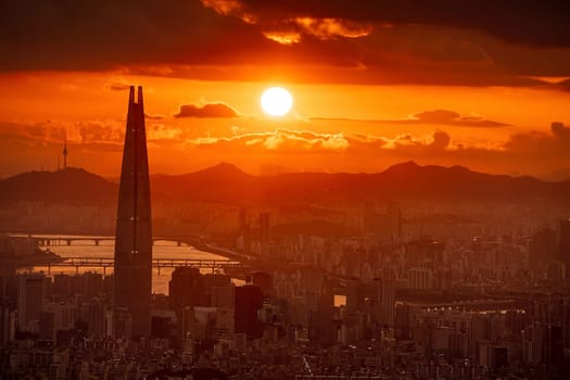 Silhouette shot of downtown Seoul city skyline, cityscape of South Korea at sunset