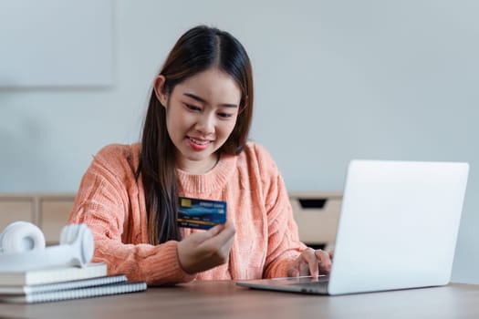 Online store icon, shopping on internet, Asian woman using on virtual screen with hands choosing on smartphone application.
