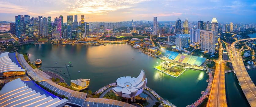 Downtown city skyline at the marina bay, cityscape of Singapore  from top view at sunset