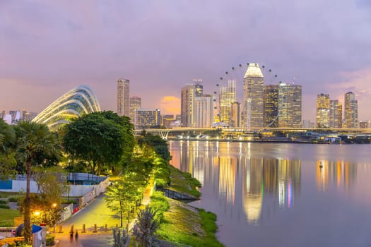 Downtown city skyline at the marina bay, cityscape of Singapore at sunset from Marina Barrage