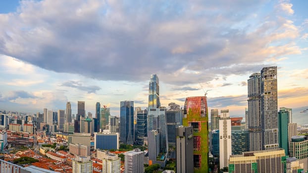 Downtown city skyline, cityscape of Singapore at sunset