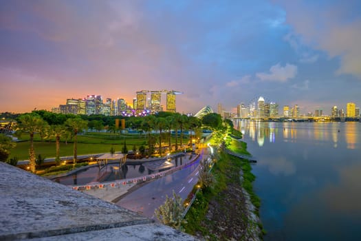 Downtown city skyline at the marina bay, cityscape of Singapore at sunset from Marina Barrage