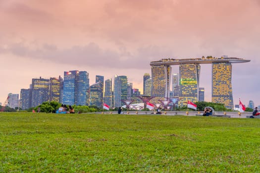 Downtown city skyline at the marina bay, cityscape of Singapore at sunset from Marina Barrage