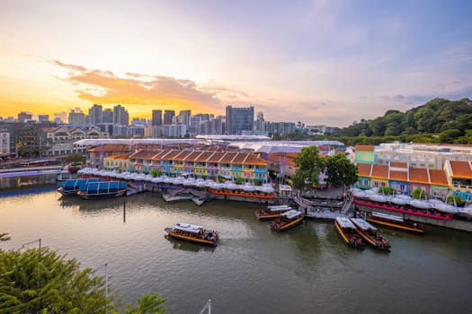 Aerial view cityscape of Clarke Quay, Singapore city skyline at sunset