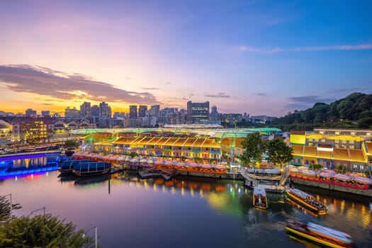 Aerial view cityscape of Clarke Quay, Singapore city skyline at sunset