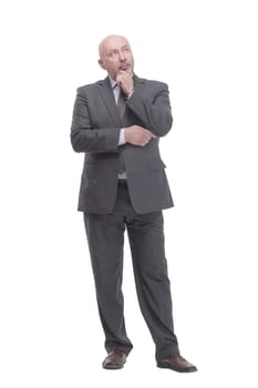 in full growth. thoughtful business man .isolated on a white background.
