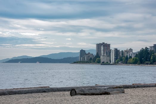 West Vancouver side overview with cargo ships in Burrard inlet.