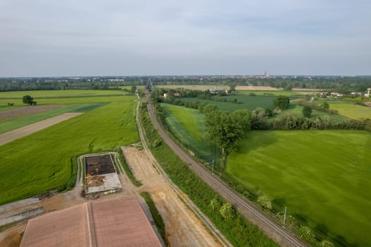 Flying over railway tracks, top view. Railway track tracks line railroad train rail aerial photo panoramic view travel