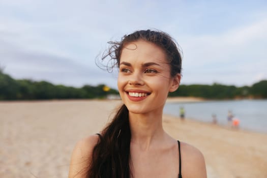 ocean woman happy walking sea copy-space sand freedom vacation sun leisure lifestyle beach sky tropical beauty holiday water smile sunset summer