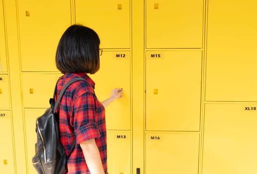Self-service storage locker. Tourist uses the service of automated locker storage. Luggage and parcel delivery service. Package locker. Mass transit system. Hour and daily storage of items luggages.