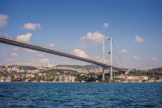 Bosphorus bridge on a summer sunny day, view from the sea, Istanbul Turkey.