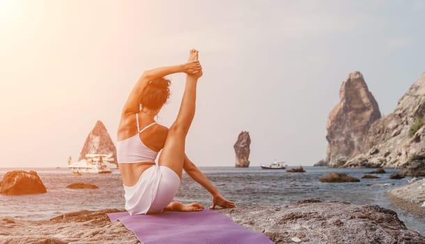 Fitness woman sea. Outdoor workout on yoga mat in park near to ocean beach. Female fitness pilates yoga routine concept. Healthy lifestyle. Happy fit woman exercising with rubber band in park.