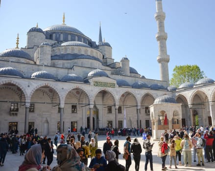 Istanbul, Turkey, May 02, 2023: Tourists admire the Blue Mosque,Sultan Ahmet Mosque. Architectural element of Muslim architecture.