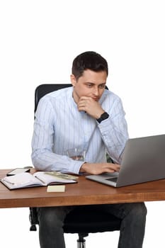 sad businessman using laptop computer for online work at table on white background