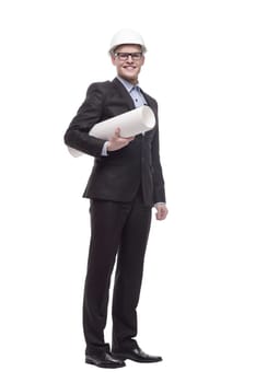 in full growth. young architect with drawings. isolated on a white background.
