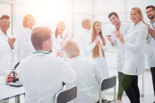 group of researchers discussing new ideas in the laboratory. photo with a copy-space