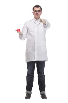 Cheerful male doctor in a white coat in gloves shows thumb up and holding the beaker