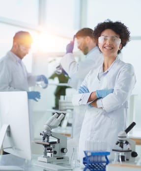 Scientists smiling together in lab
