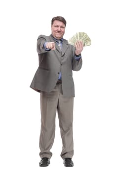 in full growth. happy man with dollar bills. isolated on a white background.