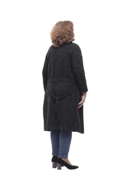 rear view. casual woman looking at a large white screen. isolated on a white background