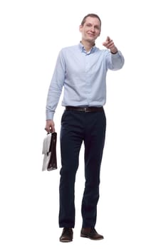 in full growth.a confident young man with a leather briefcase. isolated on a white