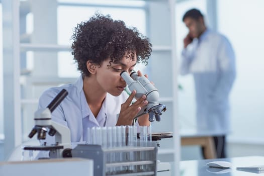 Medical Research Laboratory. Female Scientist Working with Micro