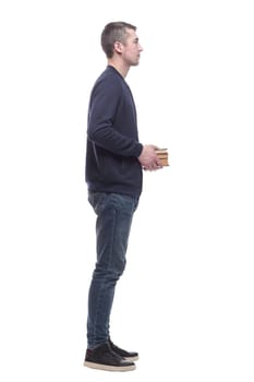 young man with a stack of books . isolated on a white background.