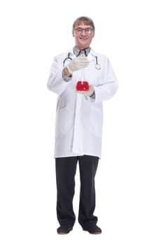 in full growth. laboratory flask with red liquid in the hands of the doctor.isolated on a white background.