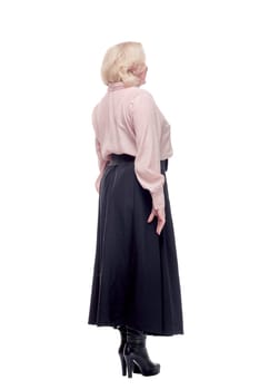 Back view of beautiful blonde woman looking at something wearing pink blouse
