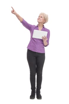 in full growth. smiling mature woman with a digital tablet . isolated on a white background.