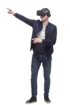 young man in a virtual reality helmet. isolated on a white background.