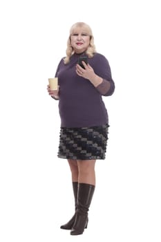 casual mature woman with smartphone and coffee to takeaway . isolated on a white background.