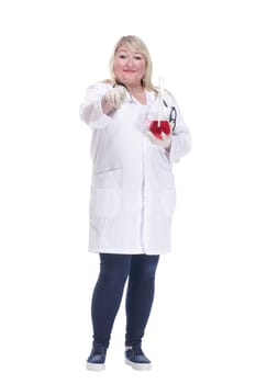in full growth.smiling woman doctor with a laboratory flask . isolated on a white background.