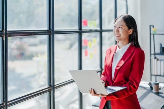 Business, finance and employment, female successful entrepreneurs concept. Confident smiling asian businesswoman, using laptop at work