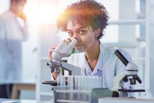 Medical Research Laboratory. Female Scientist Working with Micro