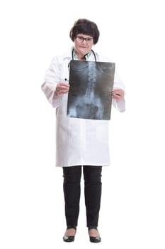 in full growth. senior female doctor with an x-ray. isolated on a white background.