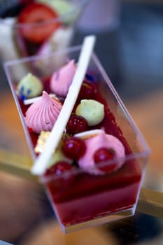 dessert in a plastic basket on the buffet table.