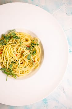 close-up of pasta of hard varieties in a white plate.