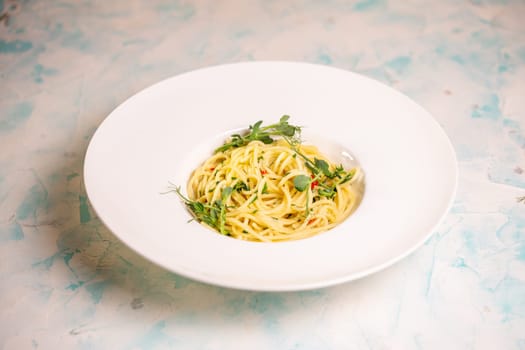 pasta from hard varieties in a white plate.