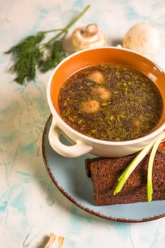 mushroom soup with toast in a cafe on the table.