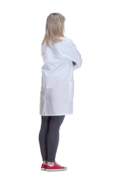 rear view.female medic looking at a white screen . isolated on a white background.