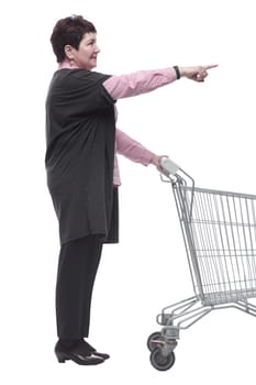 side view. a female customer with an empty shopping cart . isolated on a white background
