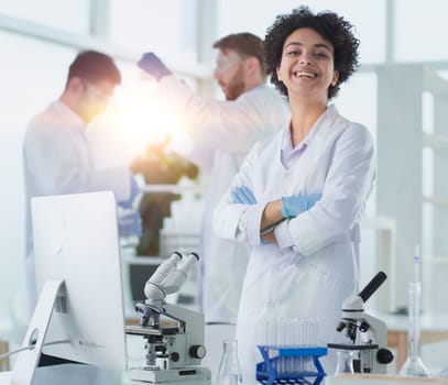 Scientists smiling together in lab