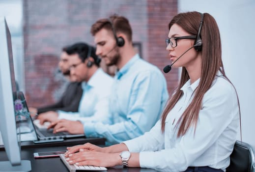 young employee call center talking with the client.photo with copy space